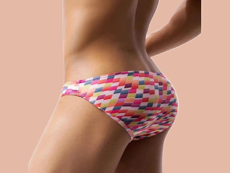Color Burst low rise gay briefs with pink red yellow geometric pixel pattern