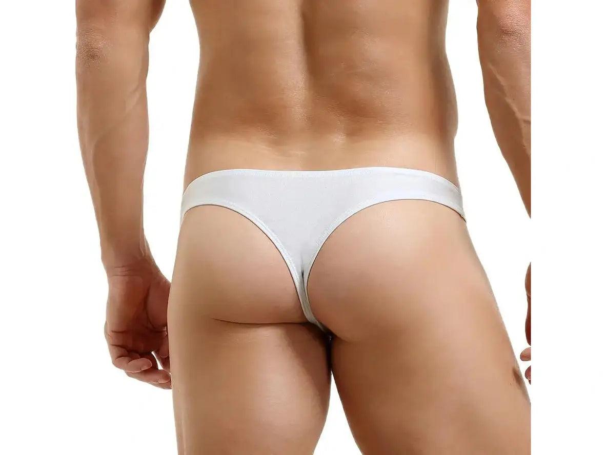 White minimalist low-rise thong back view with deep V-shaped cut and wide waistband
