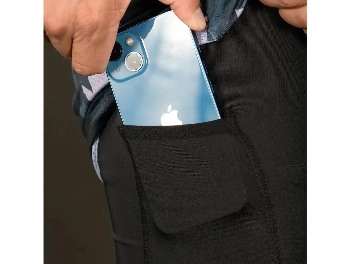 Black double-deck gym shorts with side pocket holding iPhone