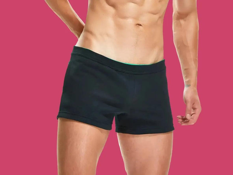 White SEOBEAN Gay Gym Shorts with blue side panel and red tag back view