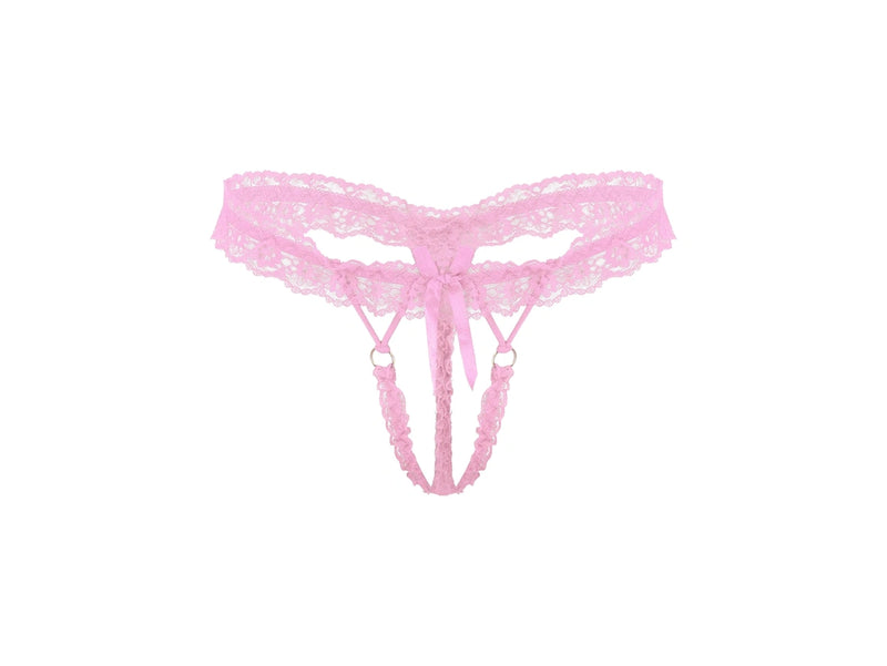 Bright pink lace thong with a matching lace waistband, front tie bow, and attached lace leg straps with small gold-tone rings, shown on a plain white background.