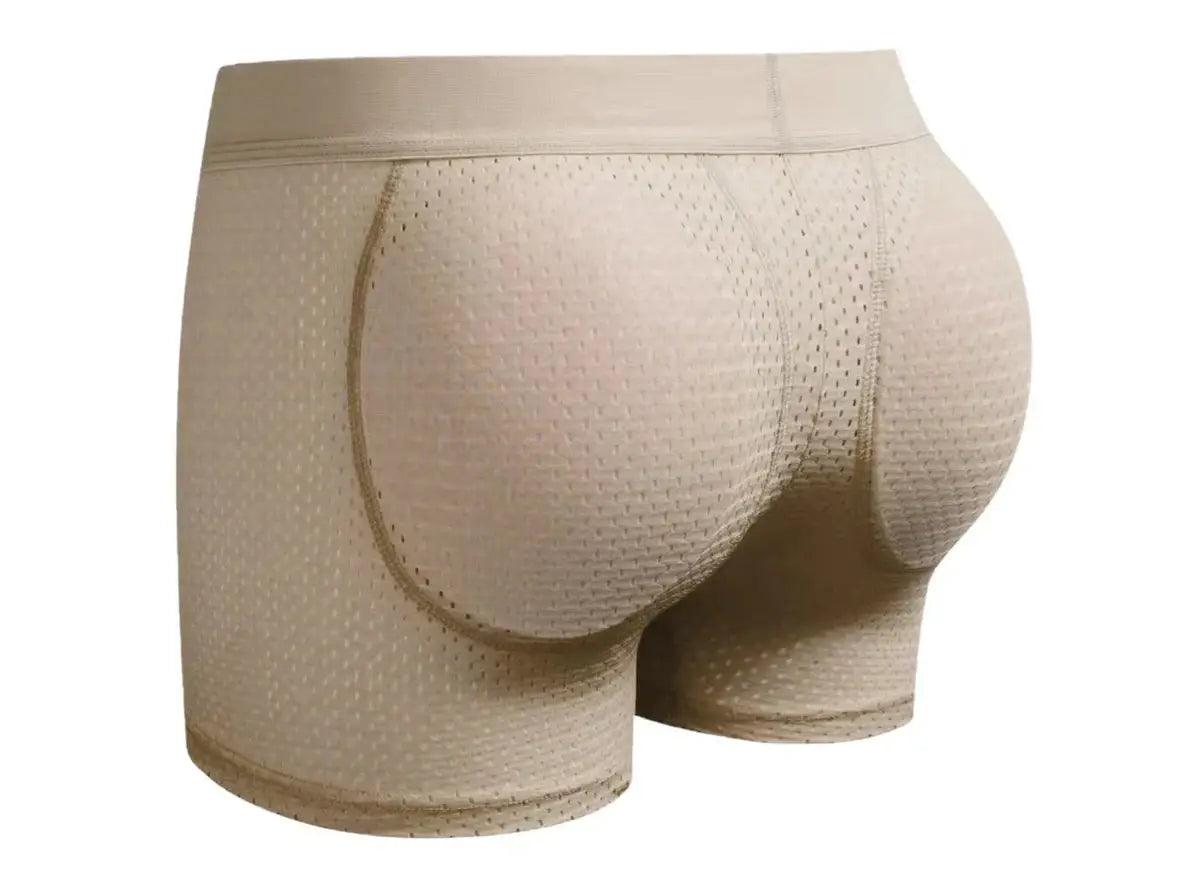 Beige stretchy boxer briefs with visible curved butt pads through perforated mesh