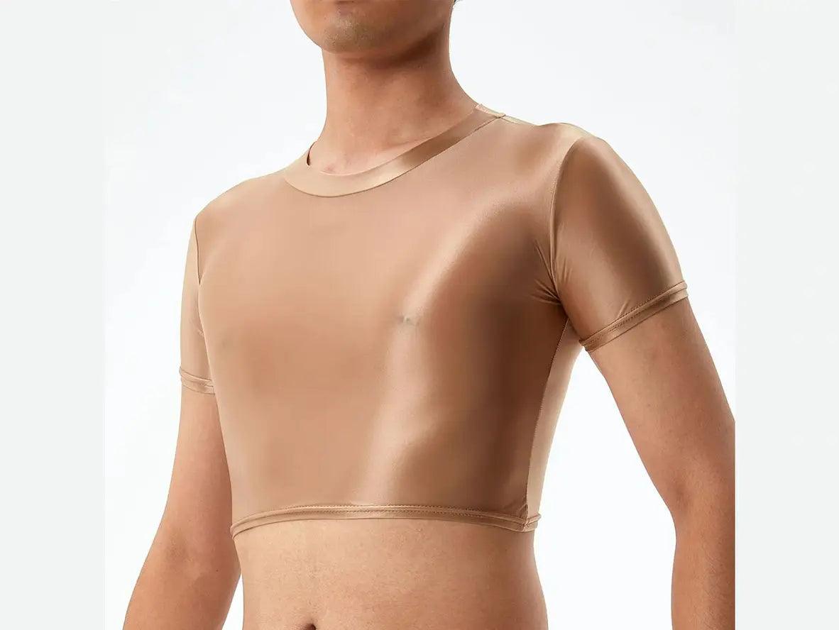 Beige glossy spandex blend crop top showing shoulder creases and shine