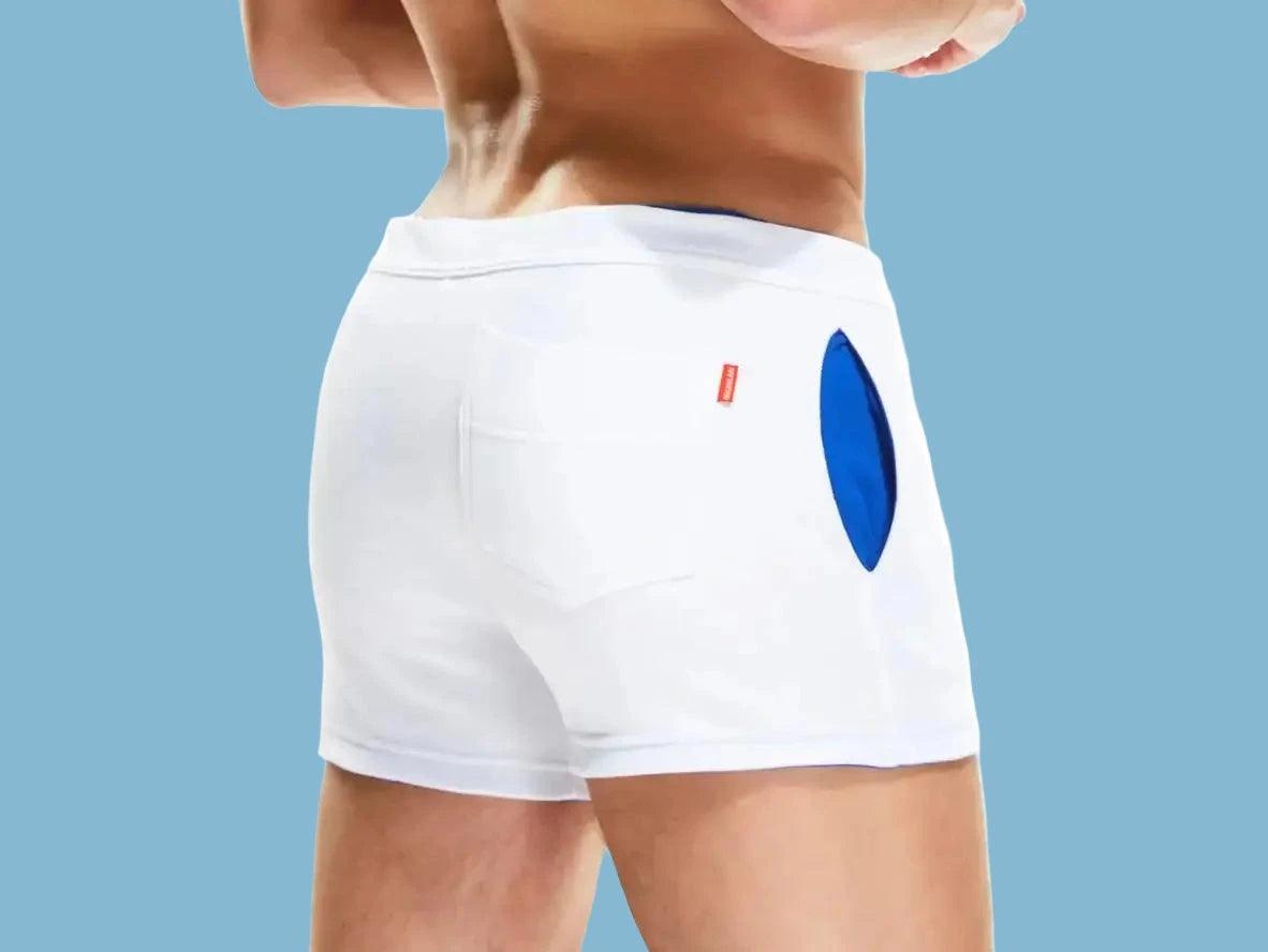White SEOBEAN Gay Gym Shorts with blue side panel and red tag back view