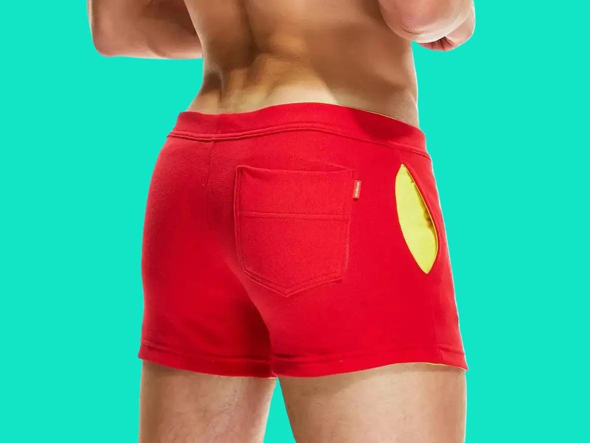 Red fitness shorts with yellow side panel and rear pocket back view