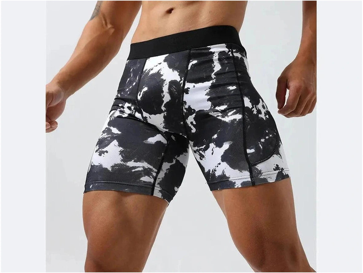 Men's black and white abstract paint-splatter compression gym shorts