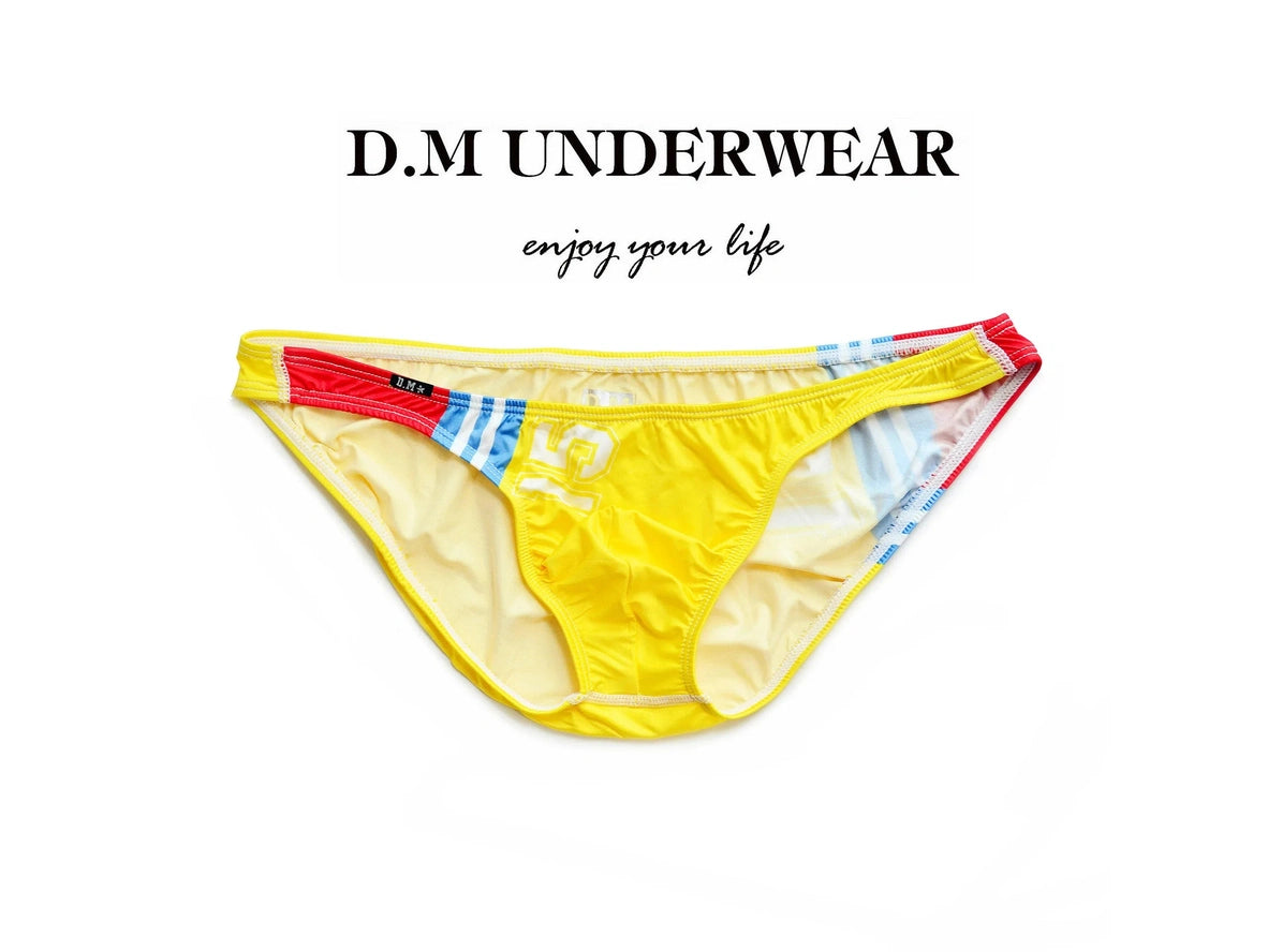 Flat lay yellow D.M ultra low-rise men's swim bottoms with patriotic stripe design