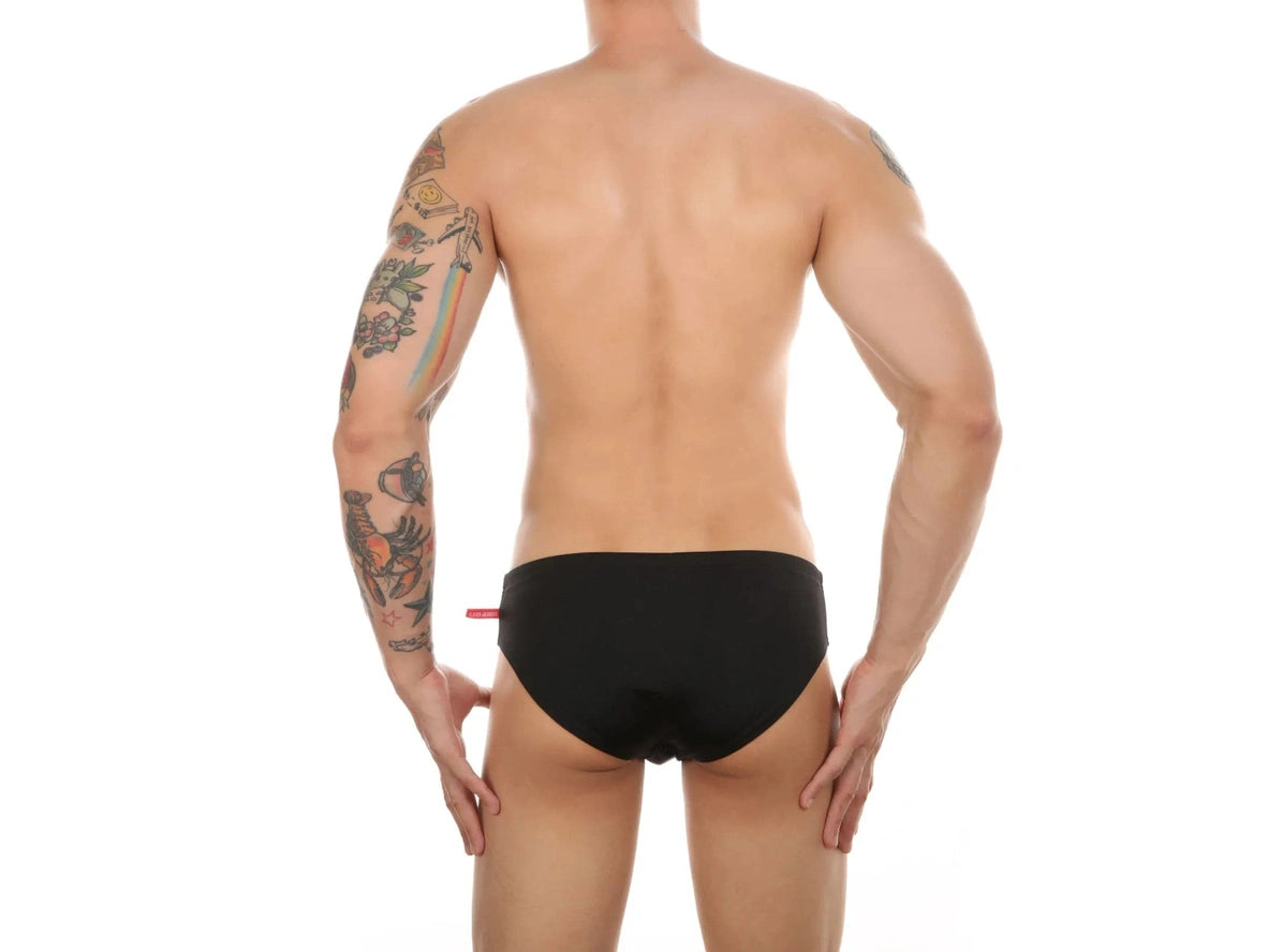 Black opaque low-rise men's swim briefs with red brand tag