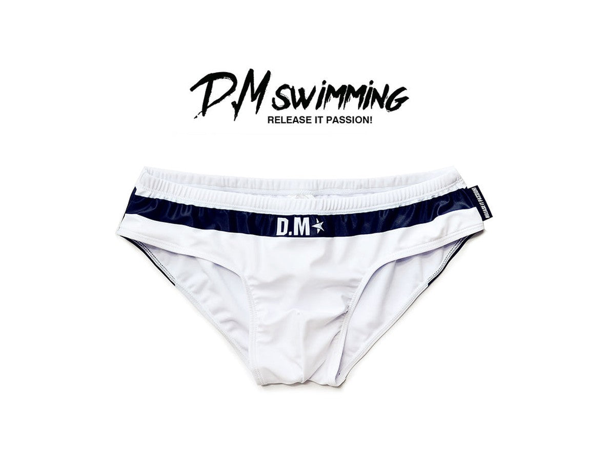 White D.M swim briefs flat lay navy stripe waistband with star logo