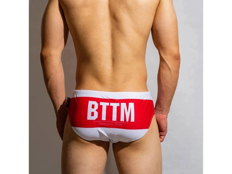 White men's swim briefs red waistband BTTM lettering back view
