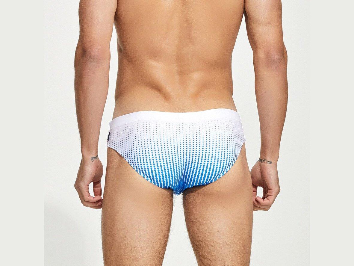 White to deep blue gradient dot pattern back view of men's swim briefs