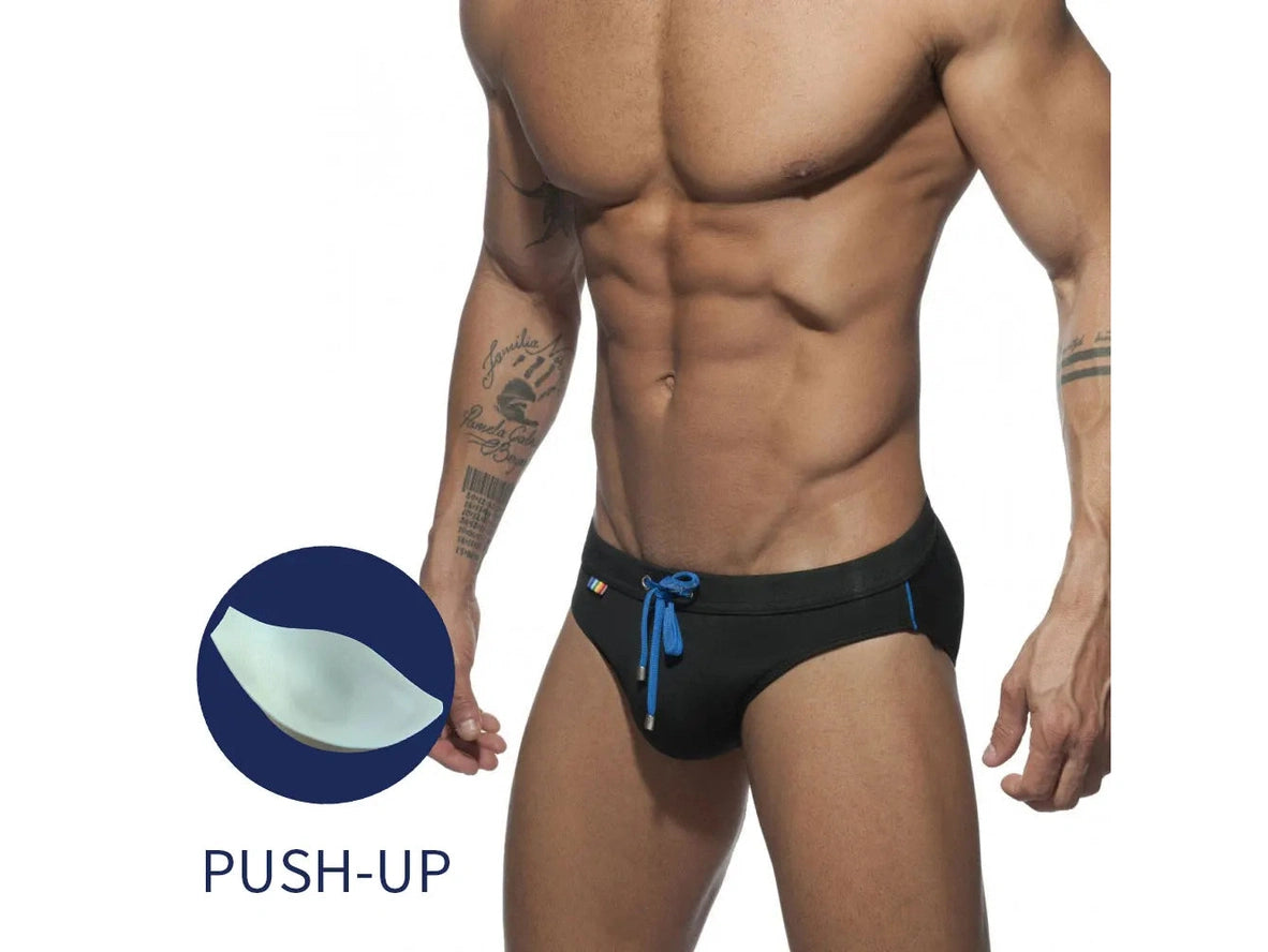 Black men's swim briefs showing teardrop push-up pad insert