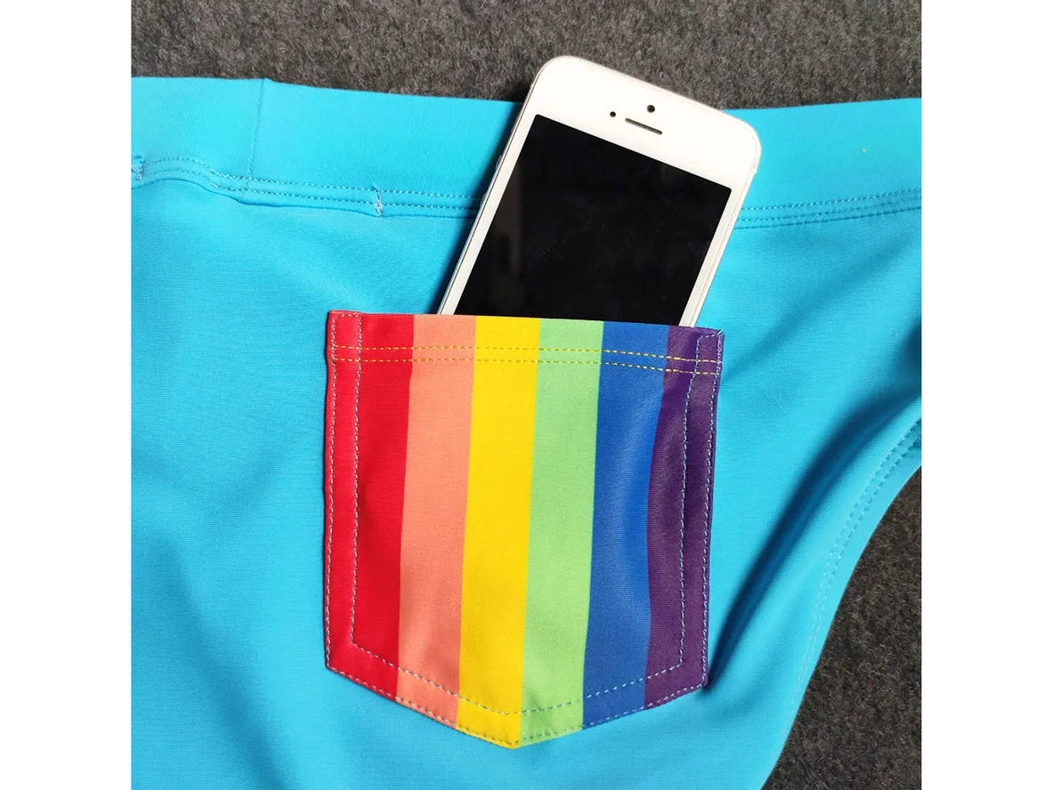 Blue swim briefs with smartphone in rainbow front pocket