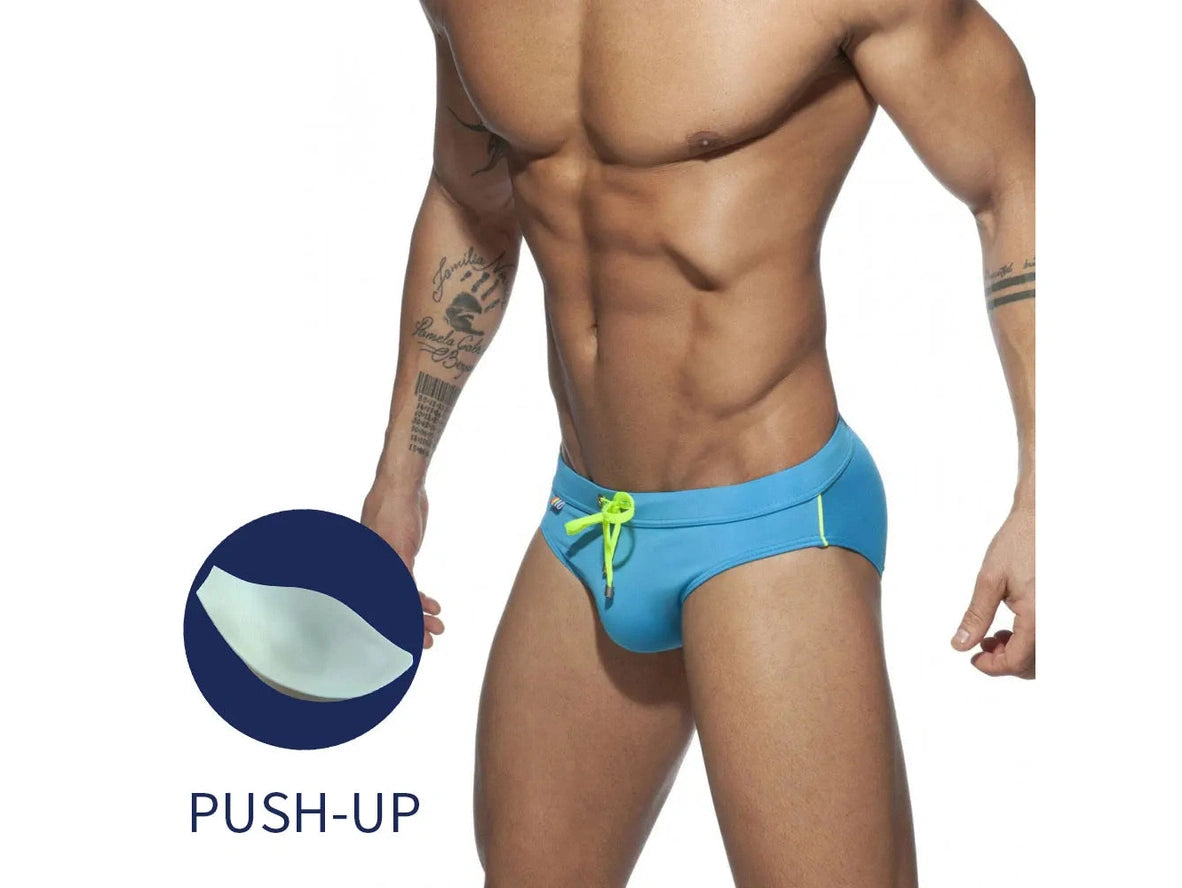 Blue push-up pad swim briefs for men with neon green drawstring