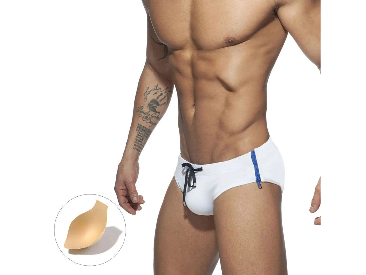 White swim briefs with beige teardrop pushup pad inset