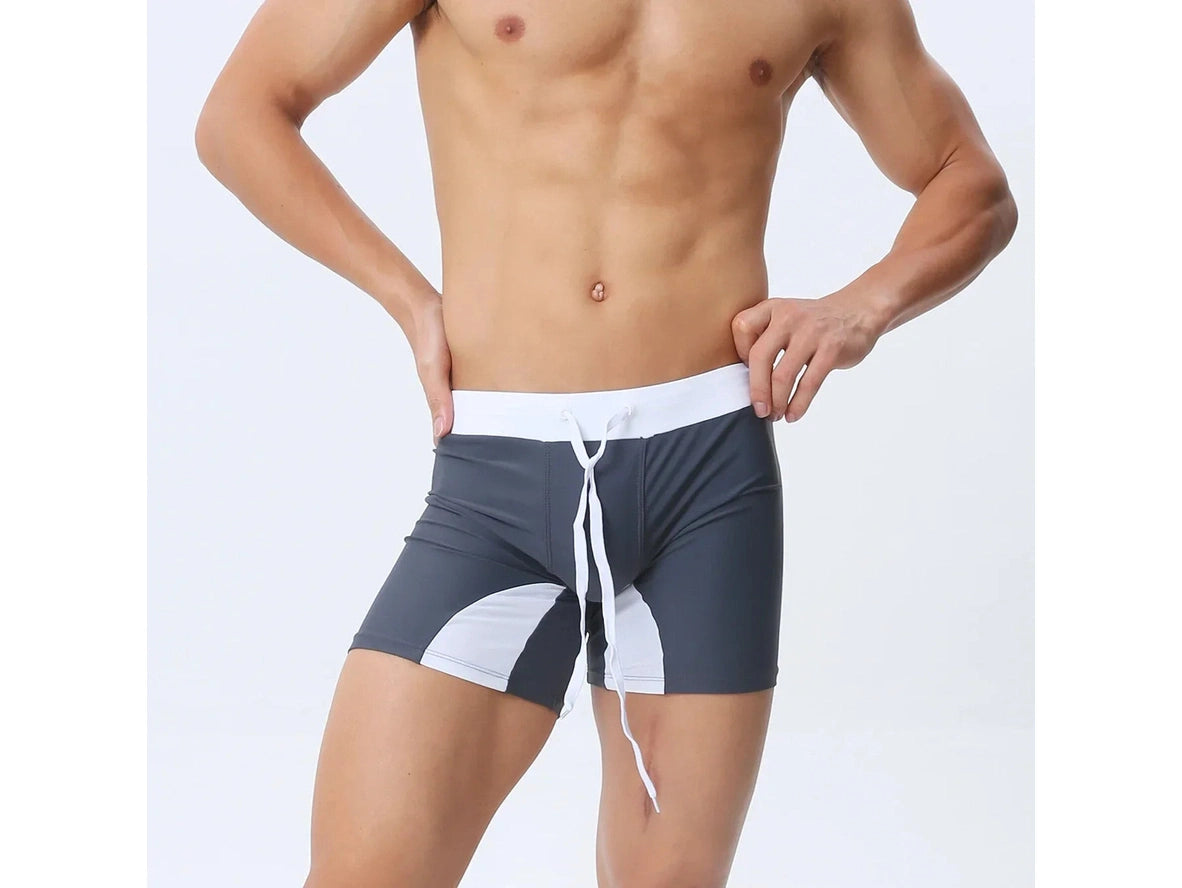 Dark gray men's swim trunks with white side panels and drawstring
