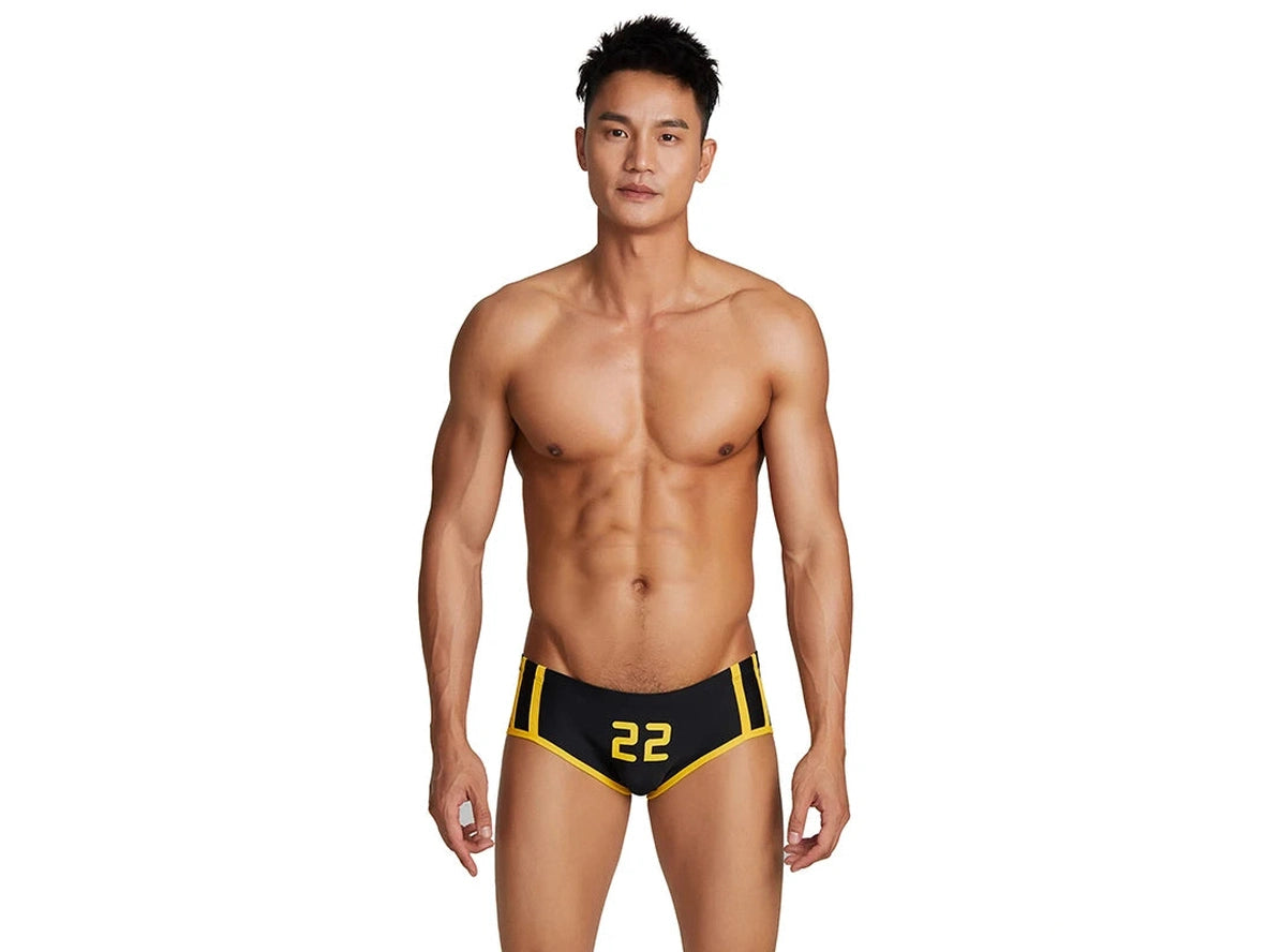 Black number 22 low-rise swim trunks with yellow side stripes