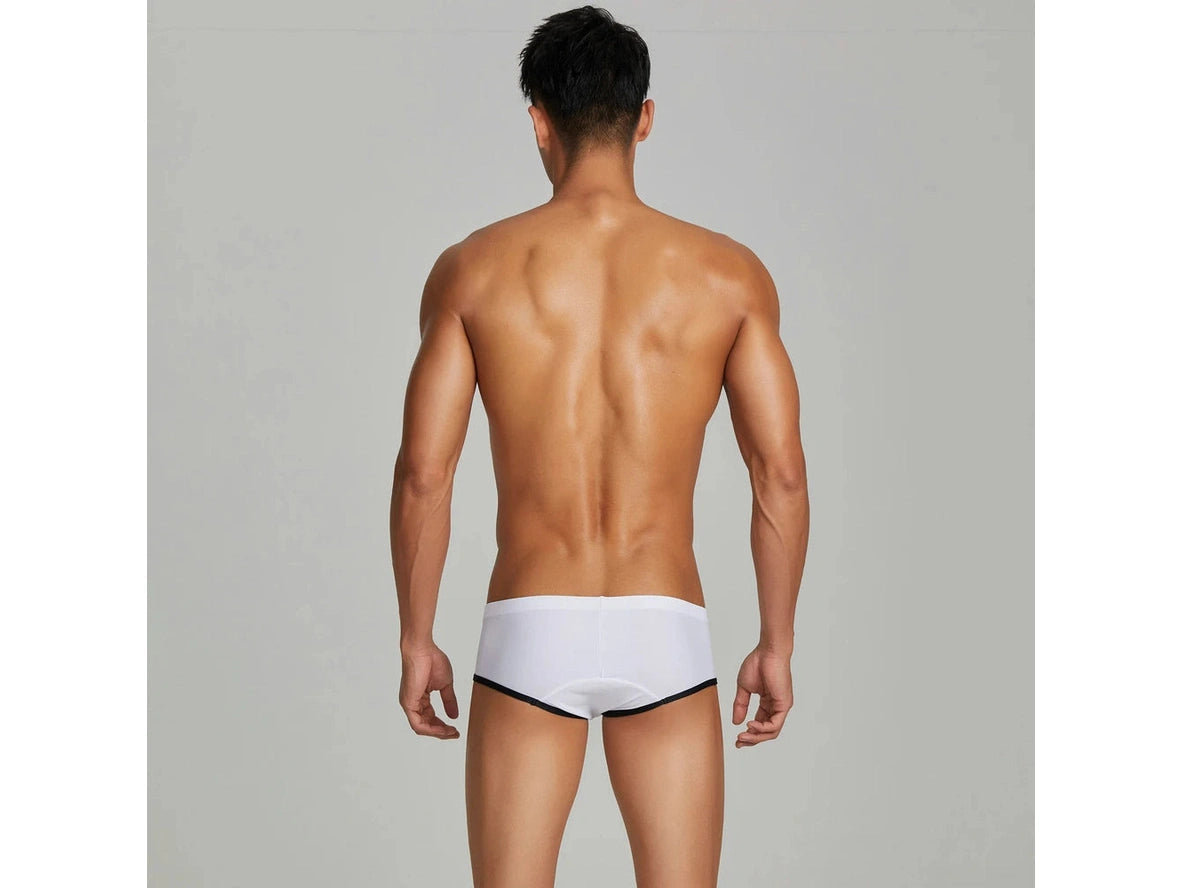 White low-rise swim trunks seamless back hem detail
