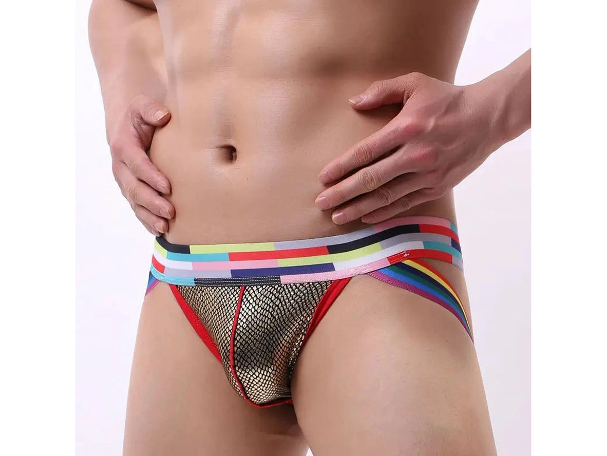 Gold-toned men's jockstrap low-rise fit emphasizing body contour and red seam detail