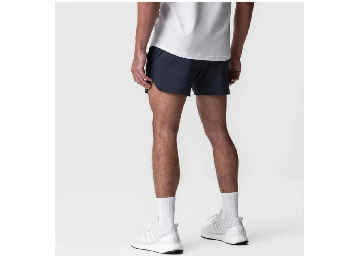 Navy men's gym shorts back view with curved hem and side slits