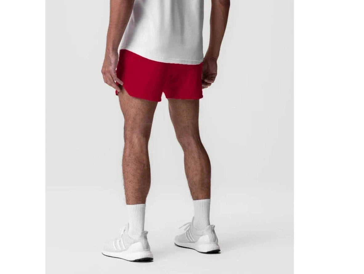 Red men's athletic shorts back view showing snug functional fit