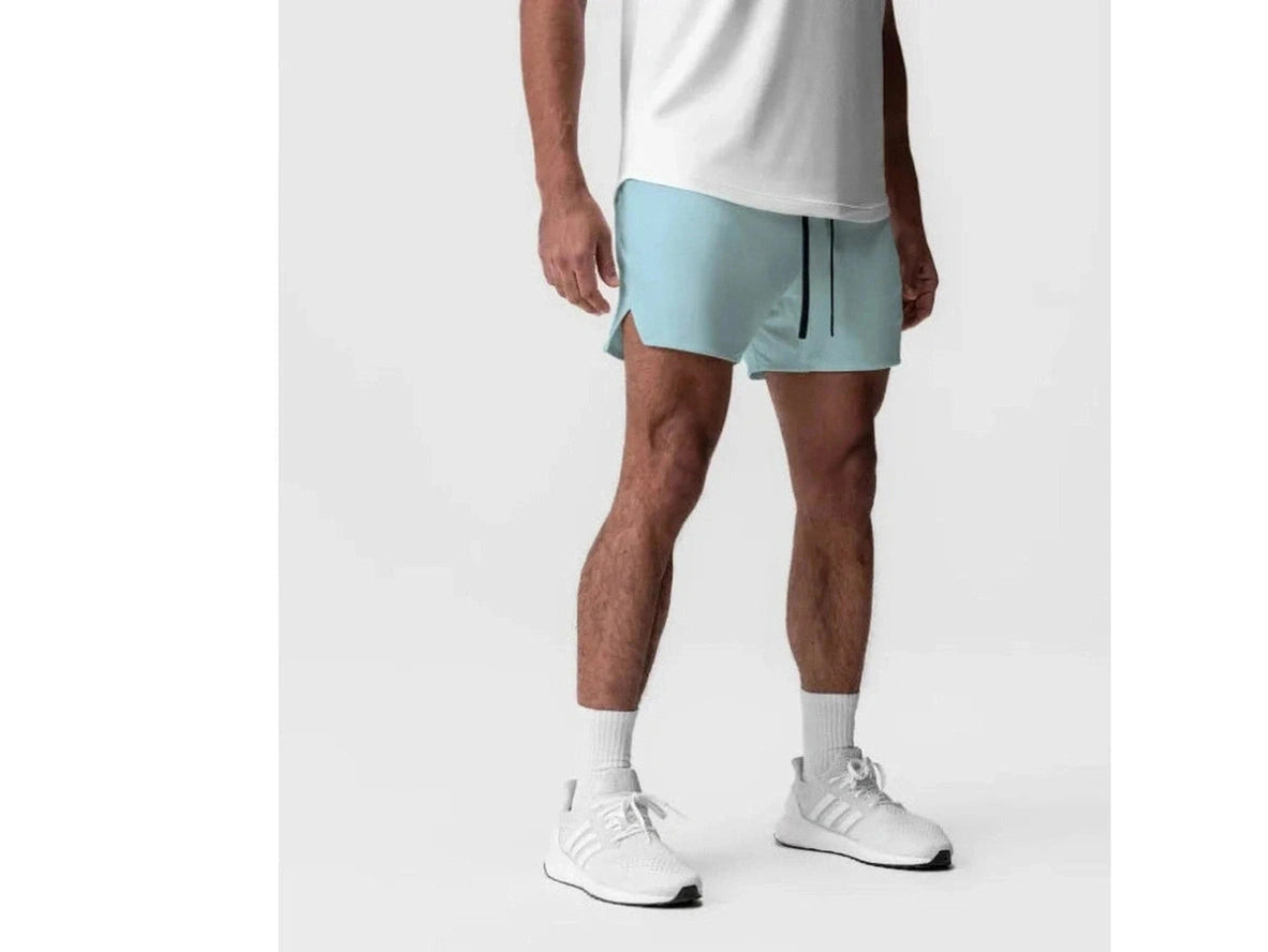 Light blue men's gym shorts with side slits and form-fitting cut