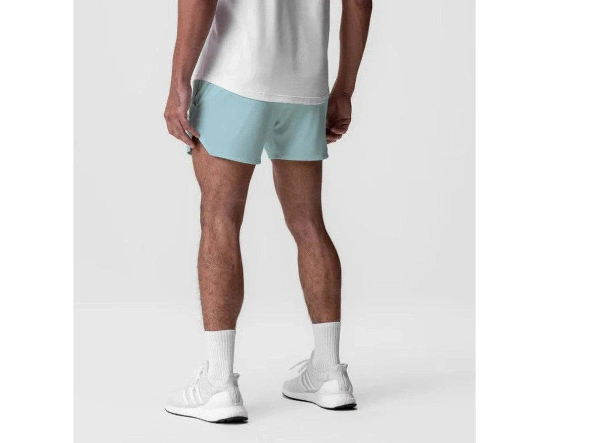 Light blue men's athletic shorts rear view with clean mid-thigh hem