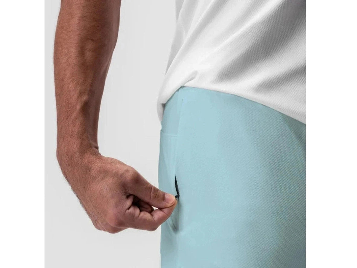 Light blue men's gym shorts with zippered side pocket and textured fabric