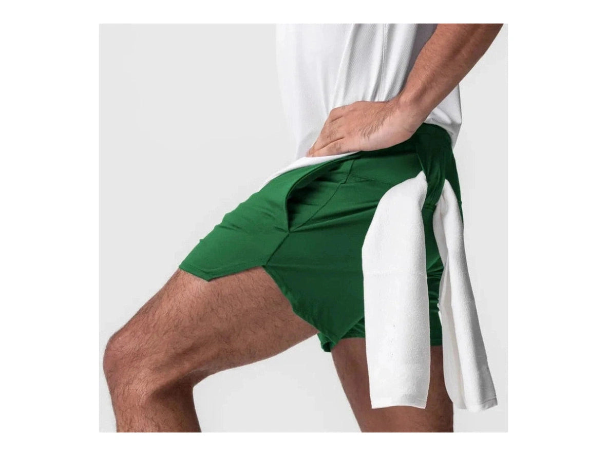 Green gym shorts close-up showing side slits and form-fitting design