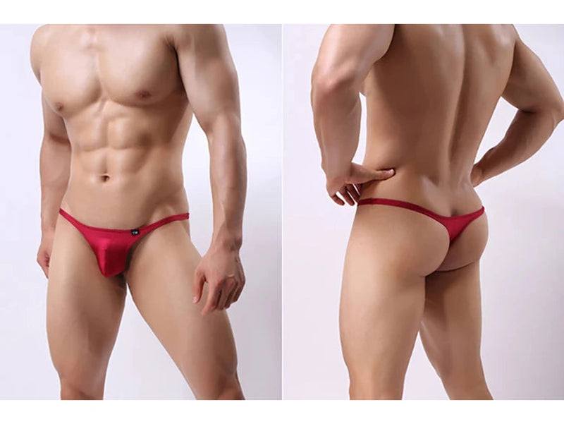 Red men's underwear worn by a muscular person on a white background