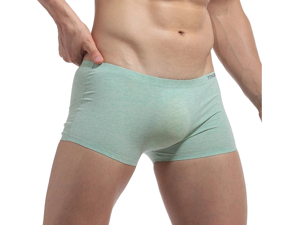 Mint green stretchy low-rise boxer briefs highlighting elastic waistband fit