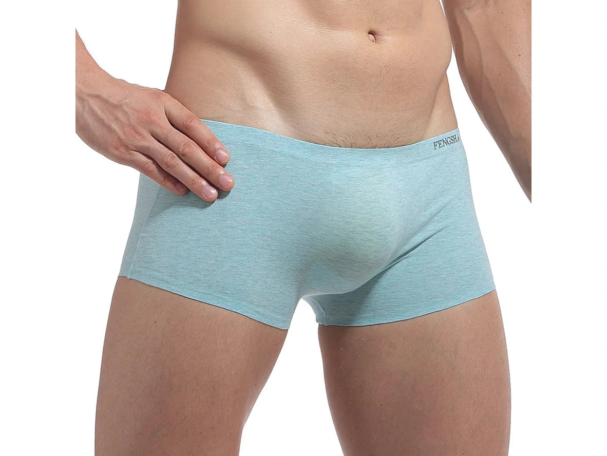 Front view of light blue seamless boxer briefs emphasizing raised pouch area