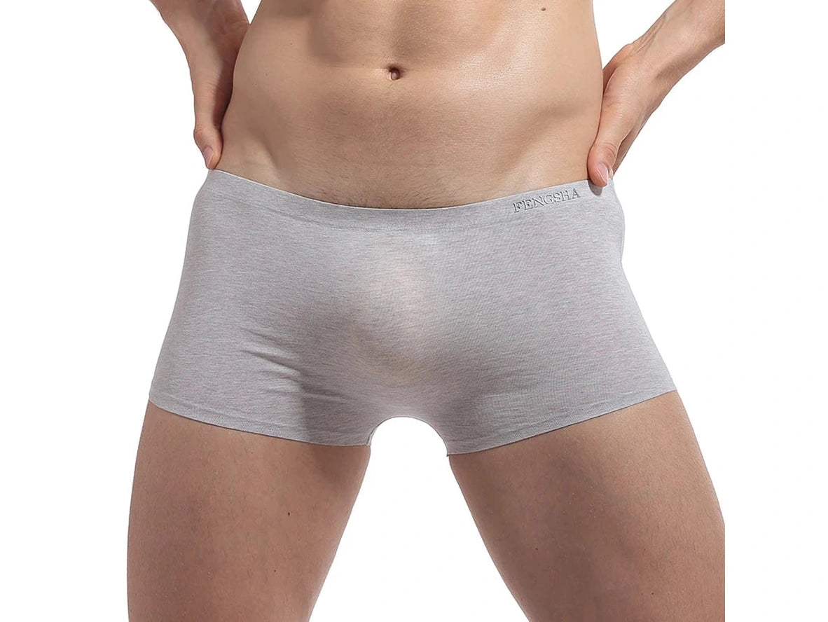 Heather gray tight low-rise boxer briefs highlighting natural body contours