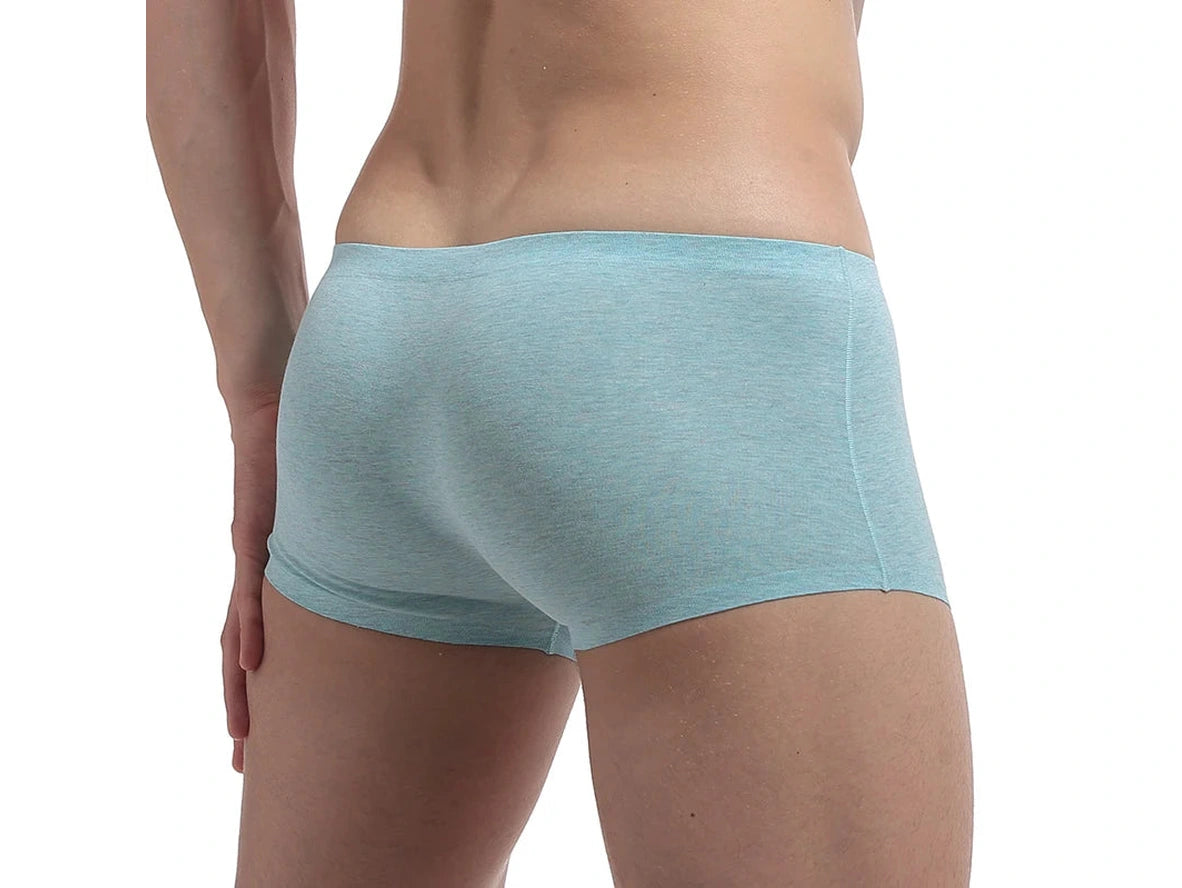Side-back view of light blue seamless boxer briefs showcasing hip contour