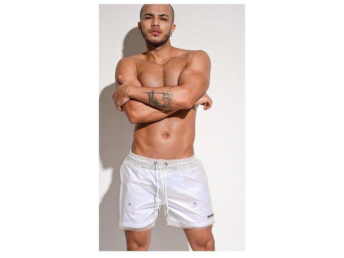 White loose transparent swim trunks with textured waistband and silver snaps