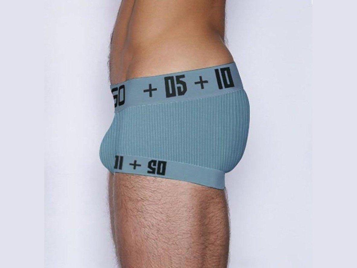 Side view of light blue ribbed boxer briefs with numeric waistband