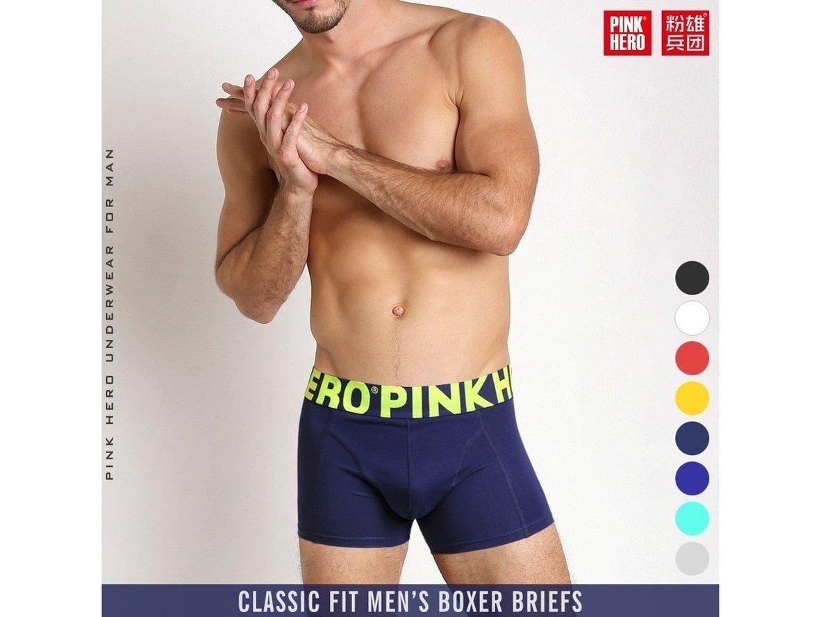 Navy blue PINK HERO men's low-rise boxer briefs on model with neon green waistband