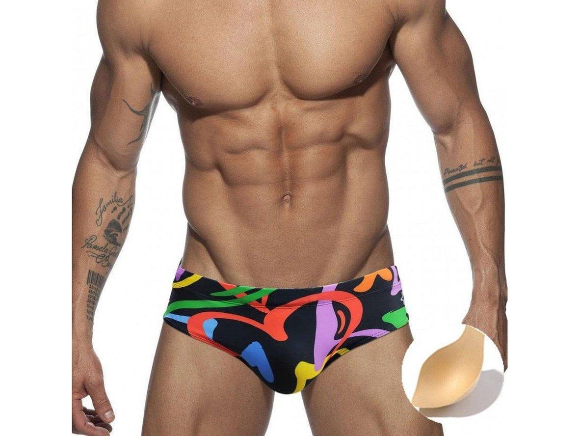 Low-rise black swim briefs with vibrant abstract print and beige push-up pad