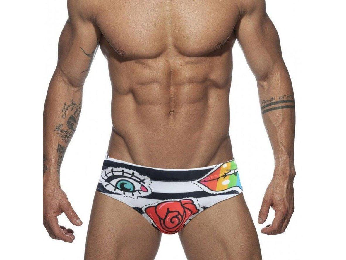 White DESMIIT gay swim briefs with eye rose graphic and striped waistband