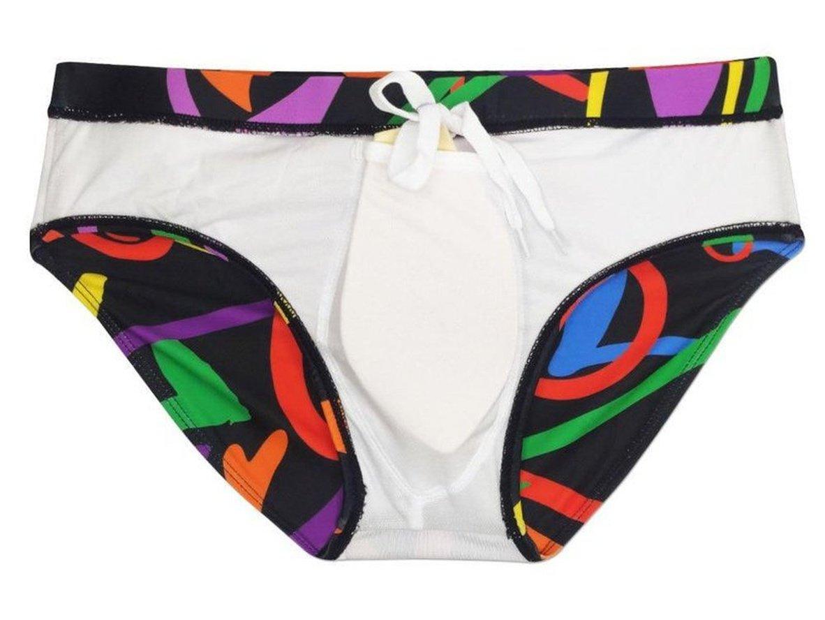 Overhead view of black swim briefs with colorful abstract print and internal push-up pad