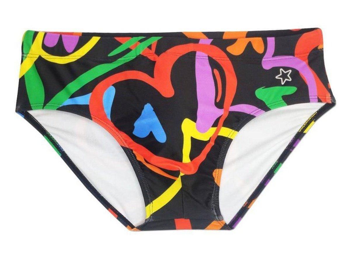 Flat lay of black DESMIIT swim briefs with multicolor abstract hearts and star print